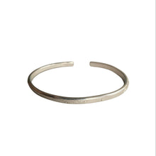 Silver bracelet on a white background